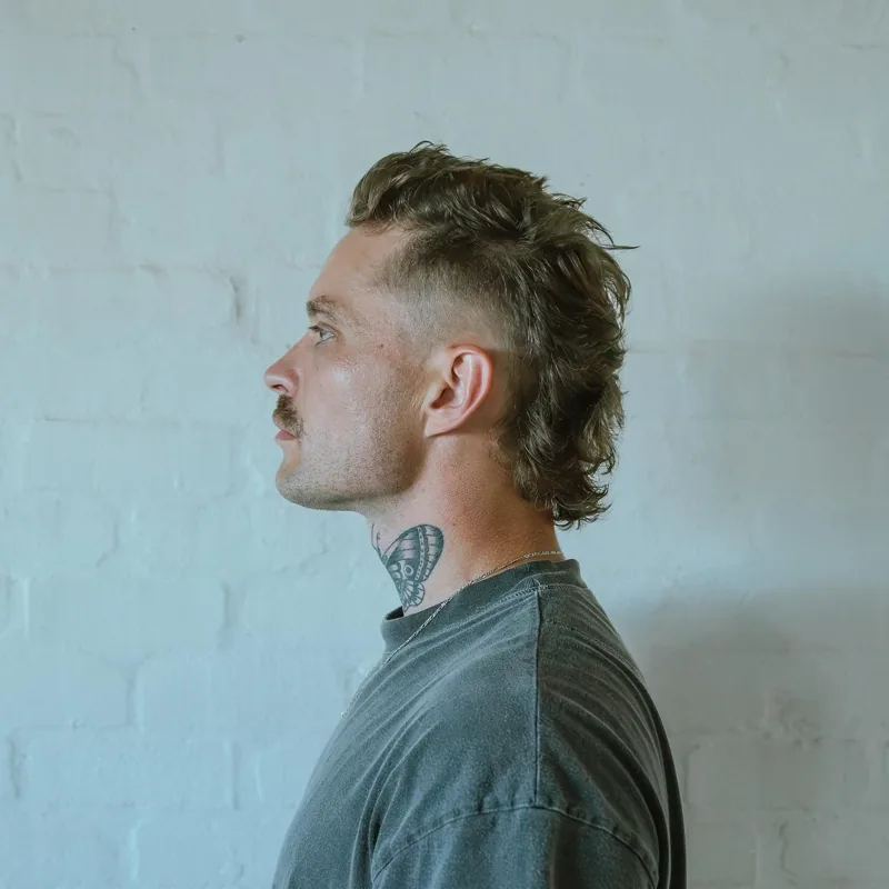Modern mullet men’s cut by Lourens at Scar Hair