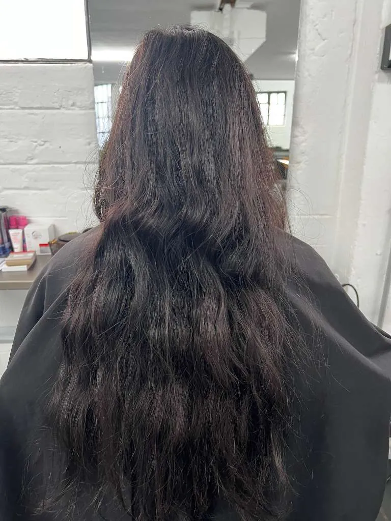 Before: warm wavy blonde with grown-out tone